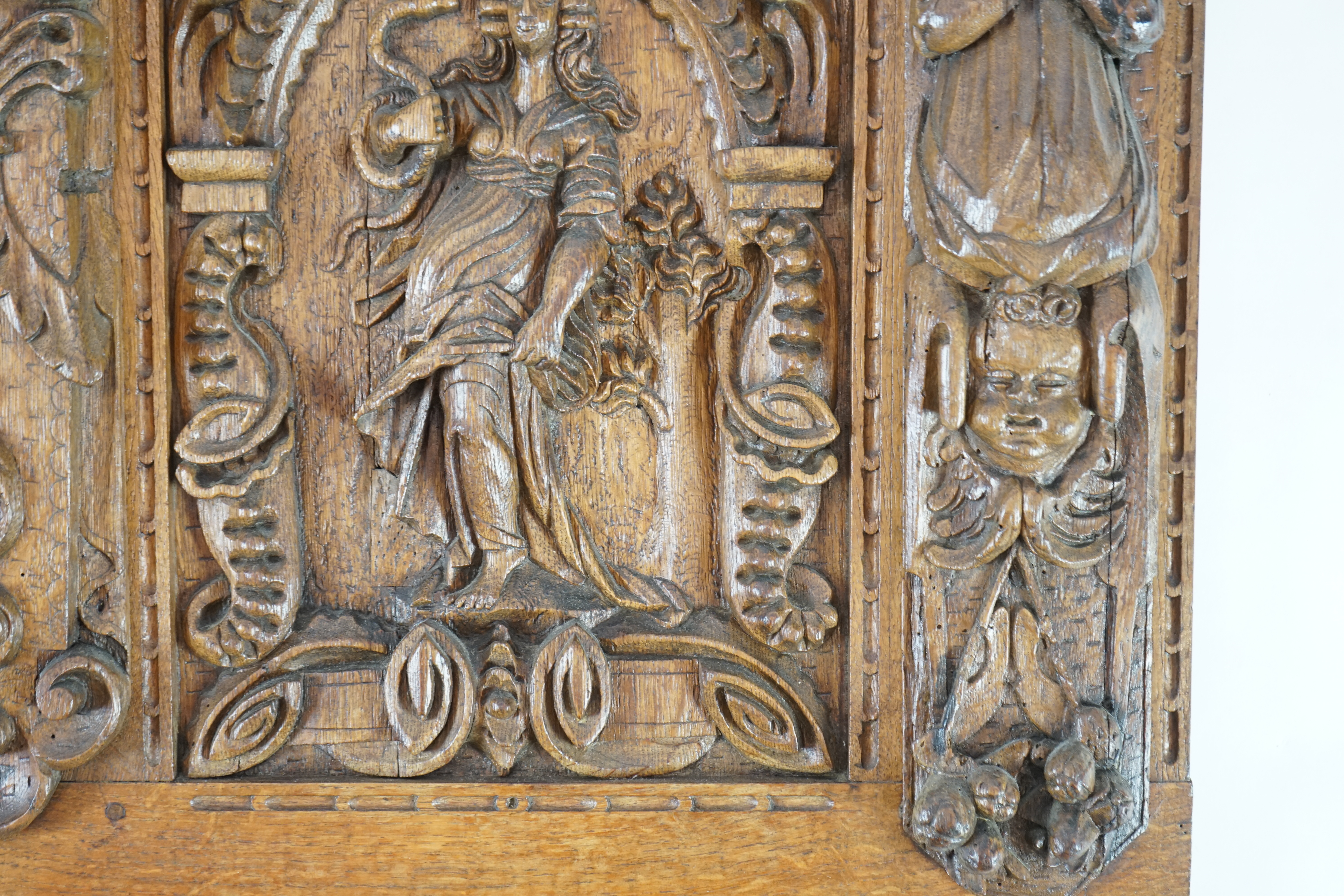 A 17th century and later Flemish carved oak panel